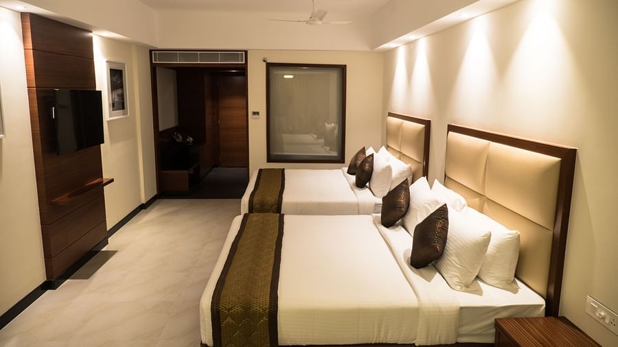 view of two king size beds of Luxury Suite Room of MM Legacy, Kanchipuram