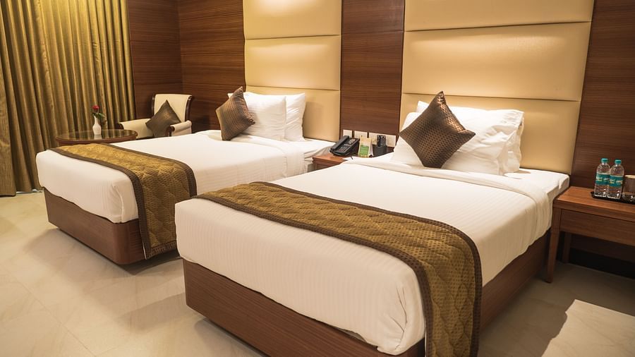 view of twin beds of Premium Twin Room of MM Legacy, Kanchipuram
