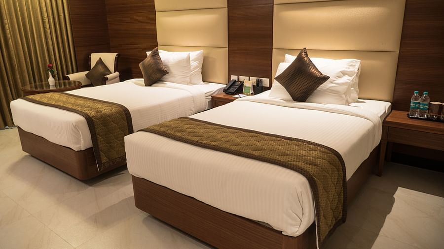 view of twin beds of Premium Twin Room of MM Legacy, Kanchipuram