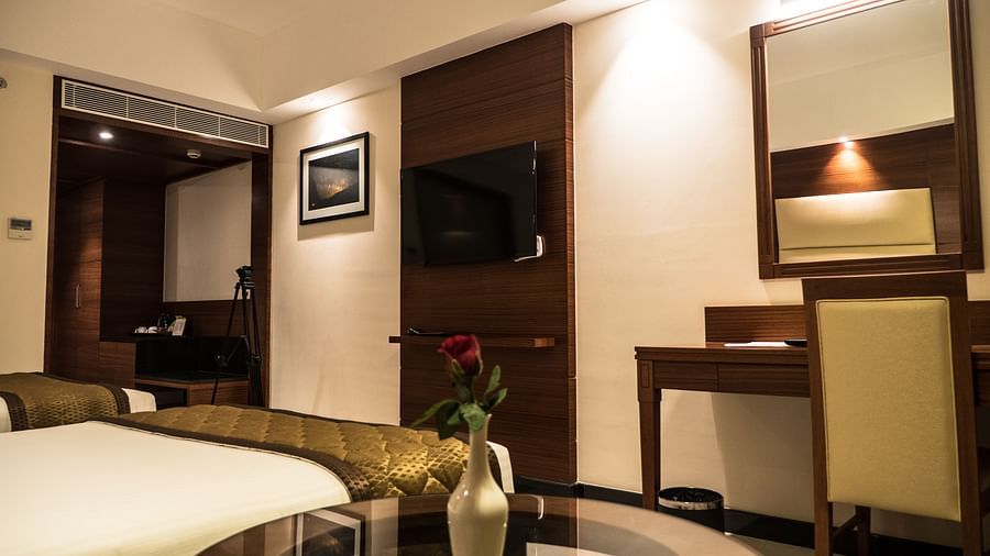 view of TV and work desk of Premium Room of MM Legacy, Kanchipuram