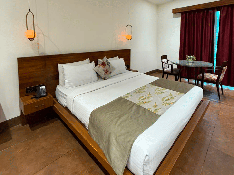 Skyline by Miraya, Club Premium, Bed and seating with garden-facing drapes