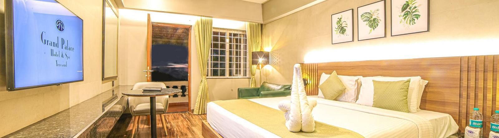 A double bed in the Premium Balcony Room at Grand Palace, Yercaud