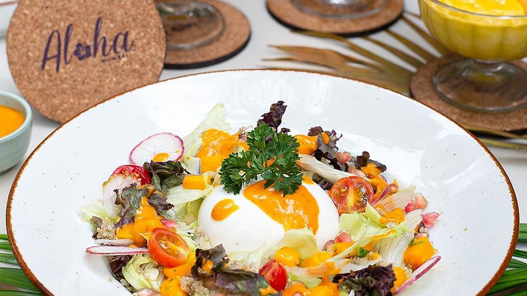 Gourmet tropical vegetable dish with mango drinks and desserts at Hotel Mumbai House Mindspace, Malad.