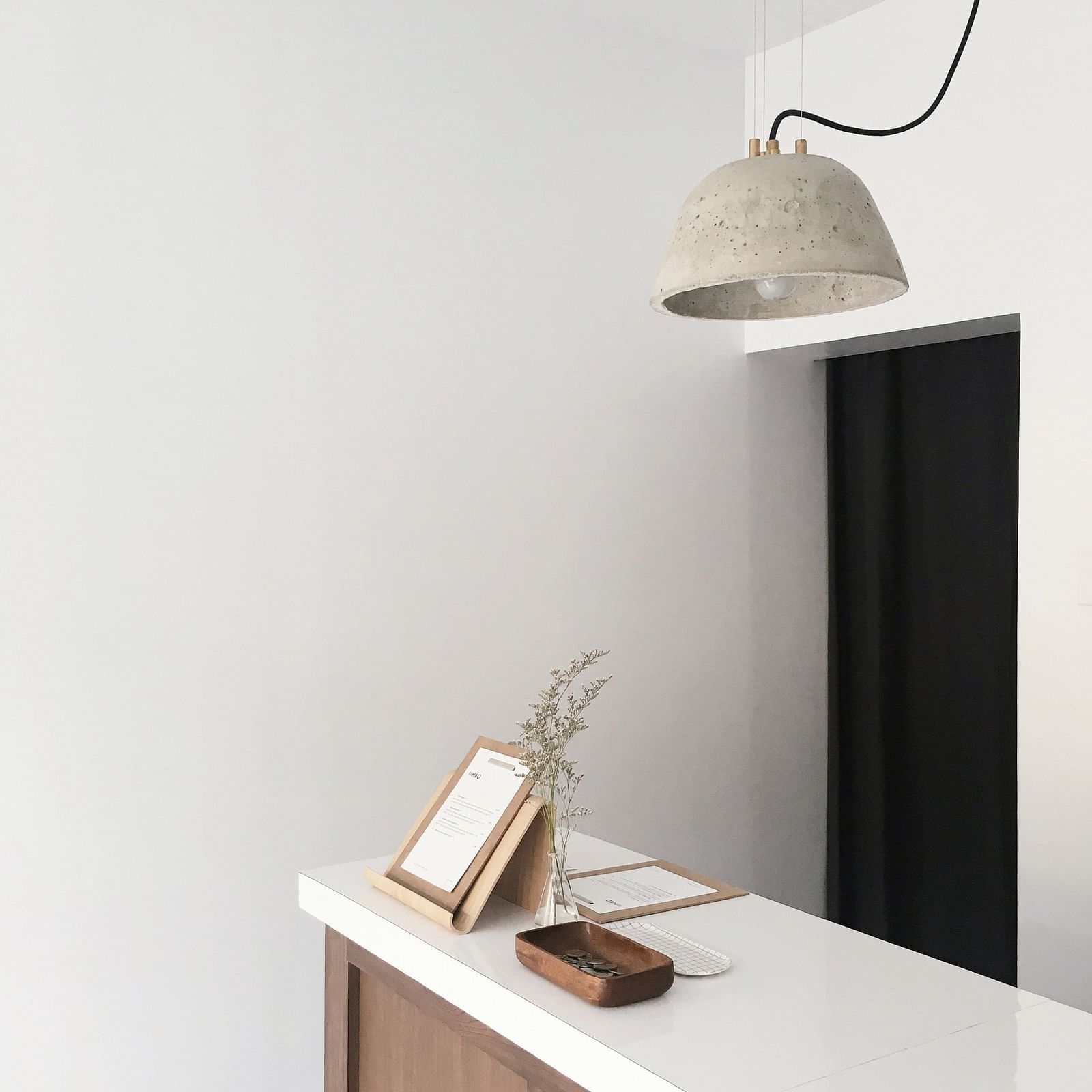 Image of a reception with white walls 