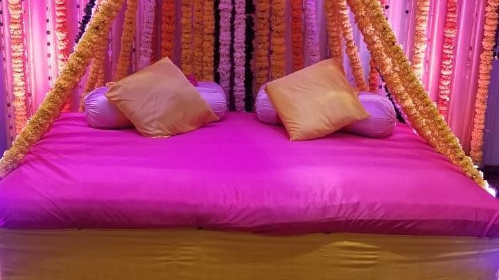 Image of  a sitting area with pillows and a canopy at The Oriental Residency