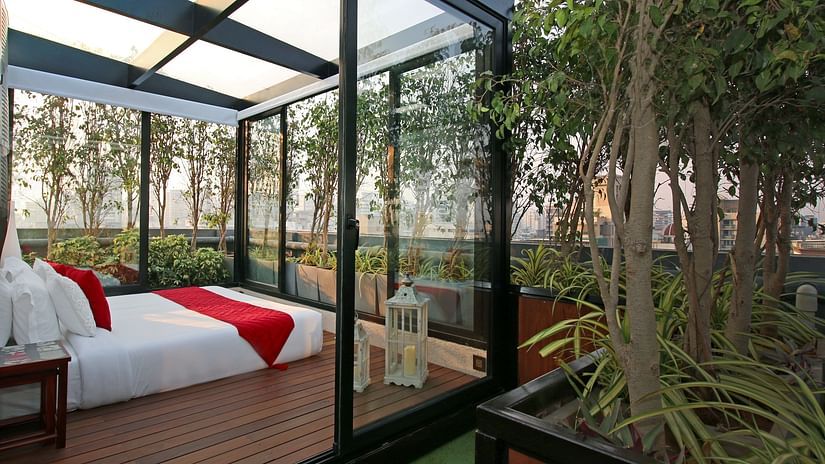 cosy bedroom with glass windows