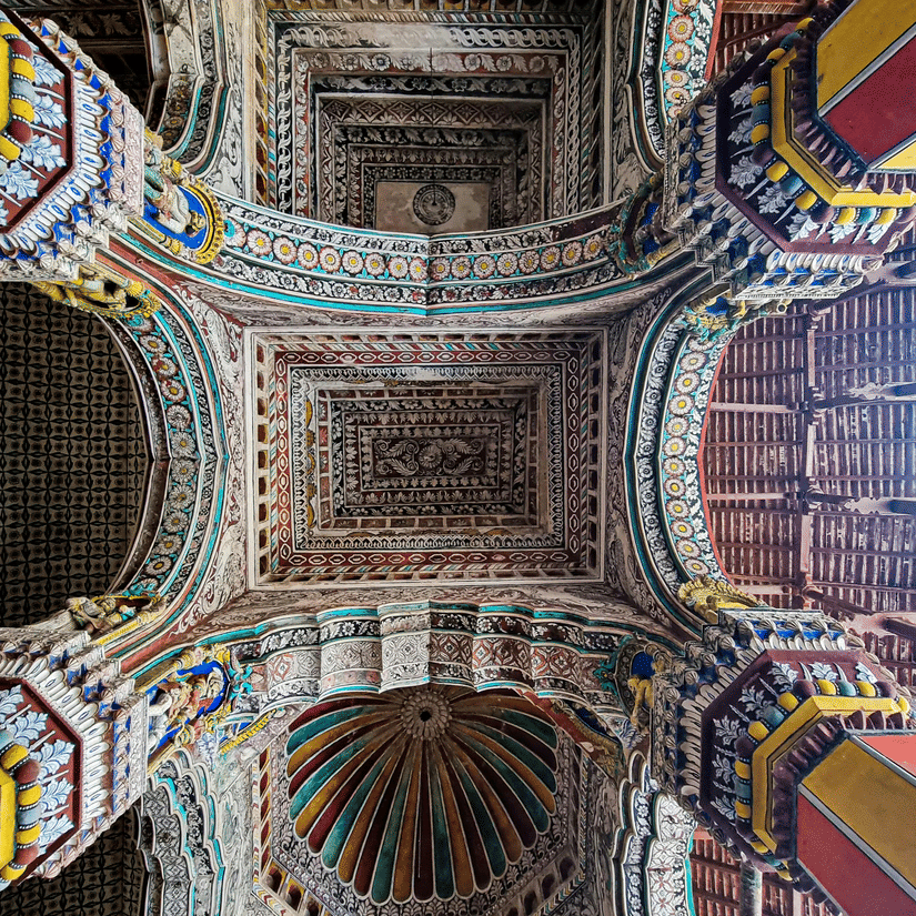 A colourfully painted ceiling artwork inside the Durbar Hall at at Thanjavur Maratha Palace.