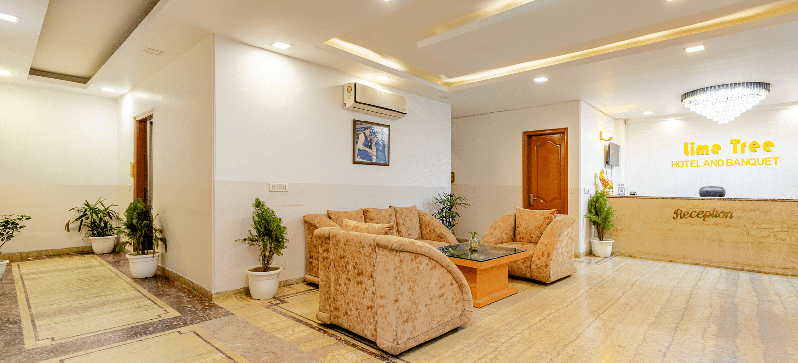 Another angle of sofas in the lobby of Lime Tree Hotels and Banquet Hall Near Huda Metro, Gurgaon