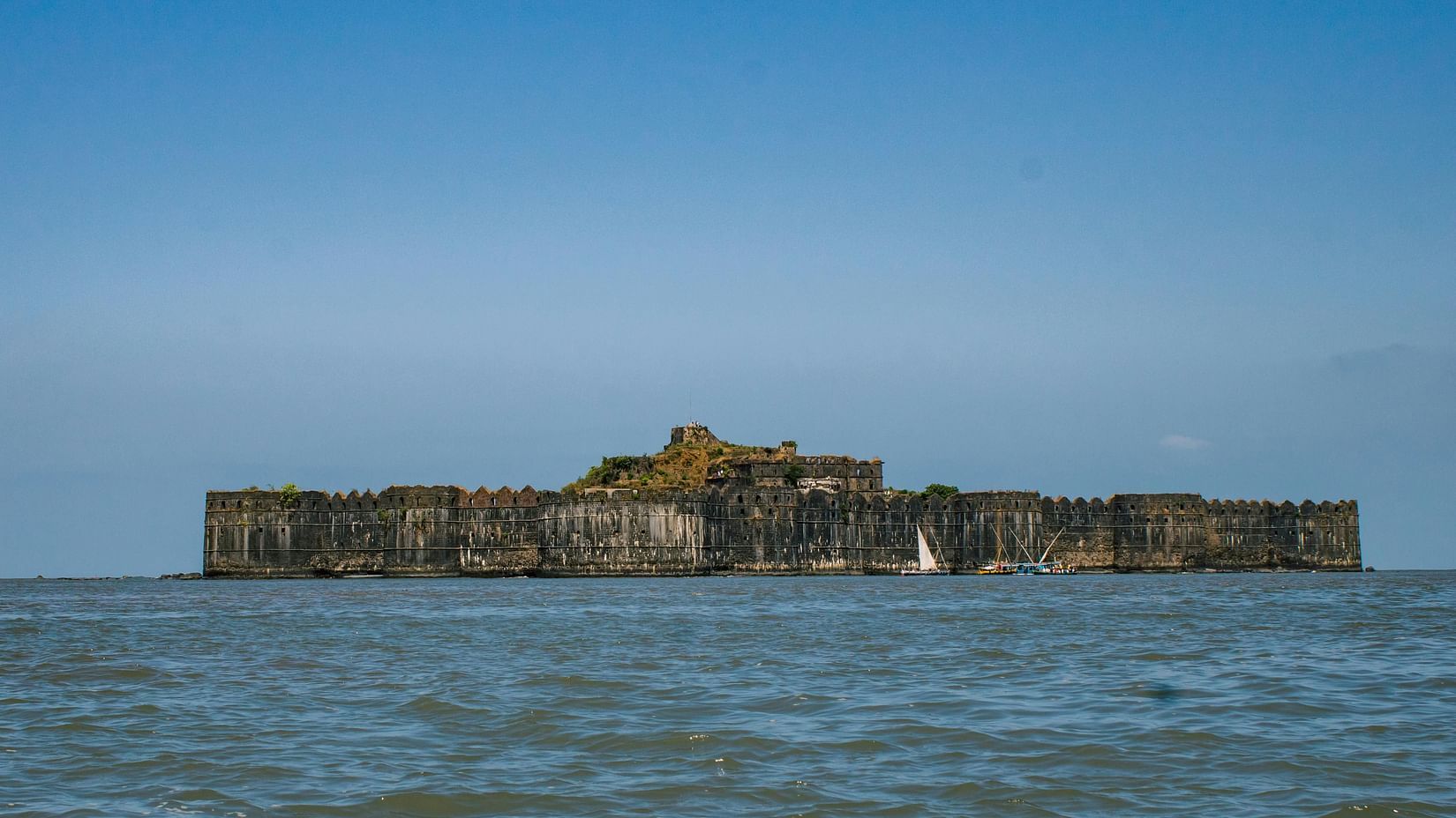 an image of Suvarnadurg fort surrounded by water - Location of Lotus Eco Beach Resort, Murud