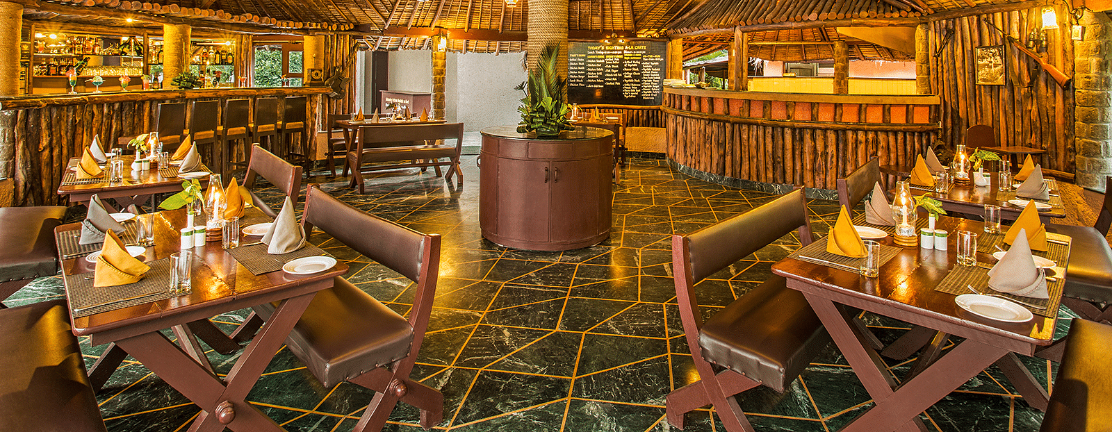 Restaurant featuring seating arrangements with vintage decor.