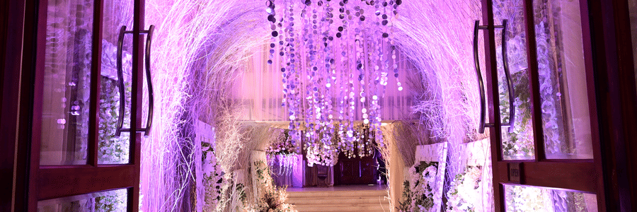 Elegant grand entrance decorated with lights and floral decor at Park Plaza, Ludhiana.