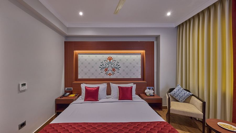 a frontal view of a king size bed - Golden Tulip, Tirupati 