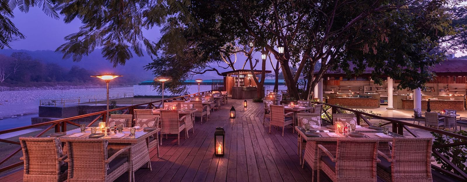 An image of an outdoor dining area beside a lake - The Riverview Retreat,  Corbett