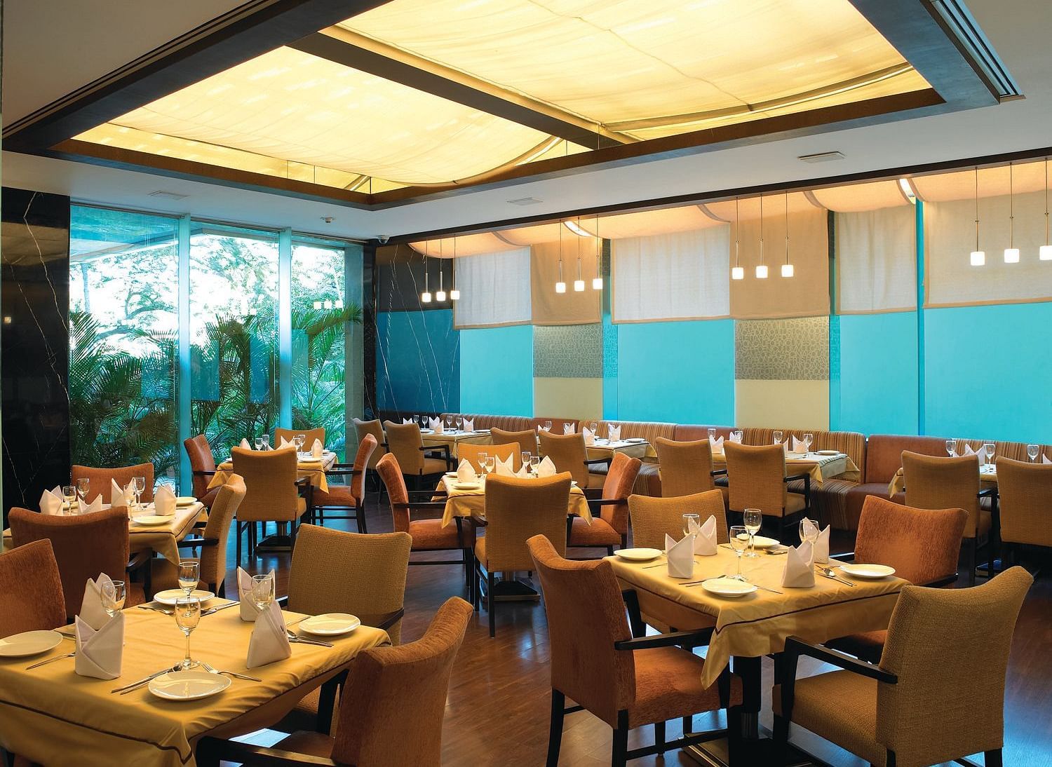 Shot of magnolia, our multi-cuisine restaurant with several seating arrangements | Mirage Hotel