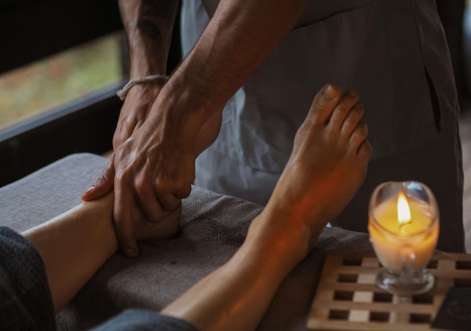 A person receiving a foot massage.