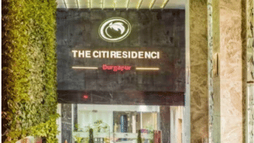 Entrance with a name board above.