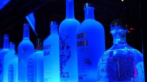 Image of different variety of bottles placed on a flat surface at Parampara Resort & Spa, Kushalnagar.