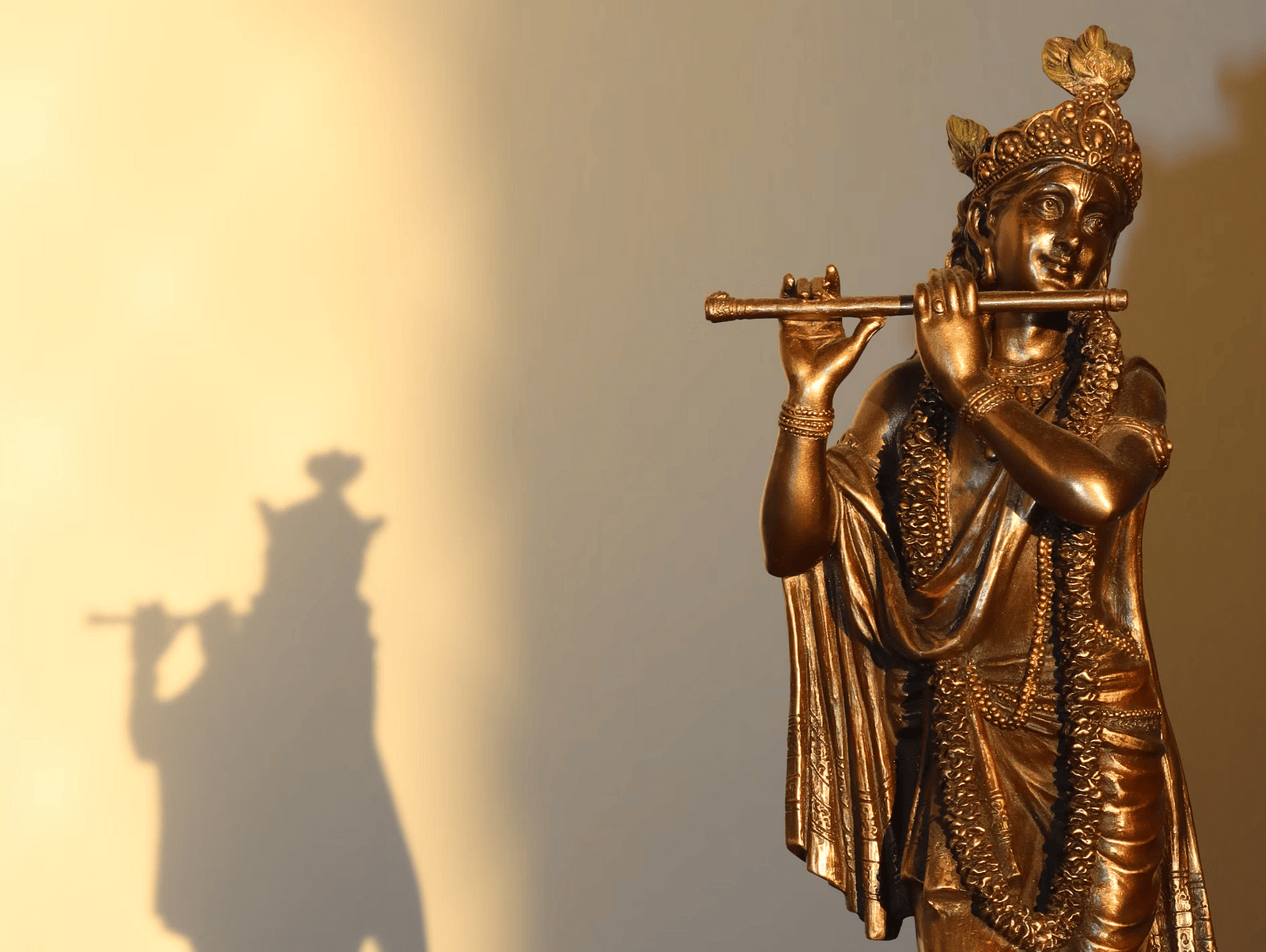 Figure of Krishna playing a flute