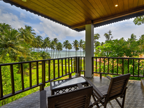 a balcony looking out at a lake