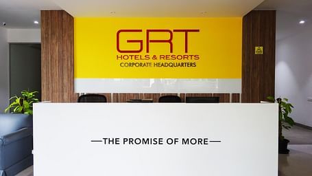 Reception area of GRT Hotel and Resorts Corporate headquarters with a tag line saying-the promise of more.