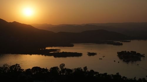 Sunset view over lakes and hills in Udaipur, as seen from near Golden Tulip.