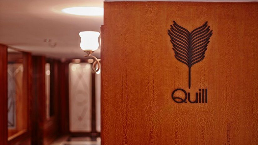 Quill hall entrance with the logo at Hablis Hotel, Chennai
