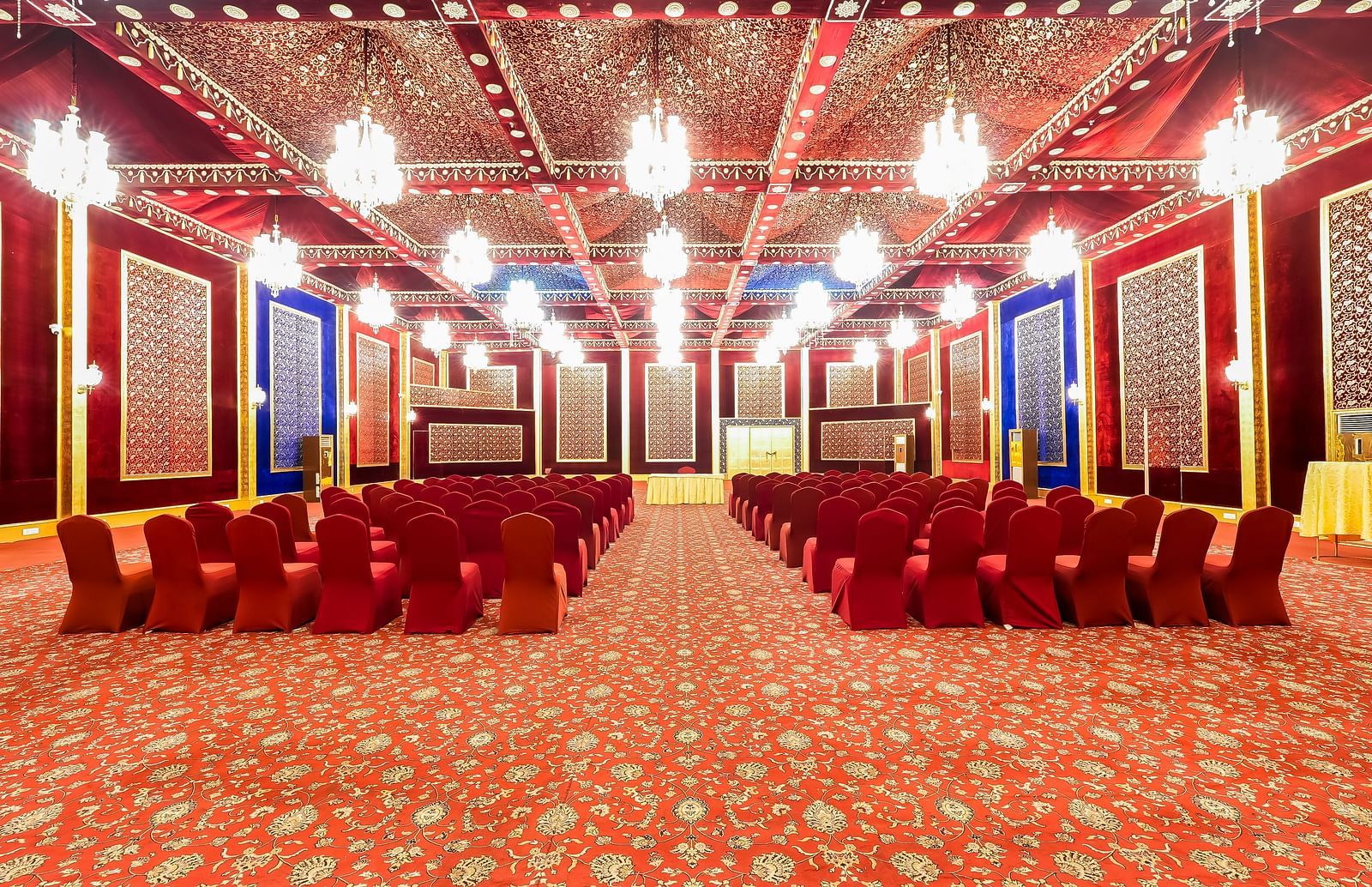 An overview of a large banquet hall with theatre style seating - Rajasthali Resort & Spa, Jaipur.