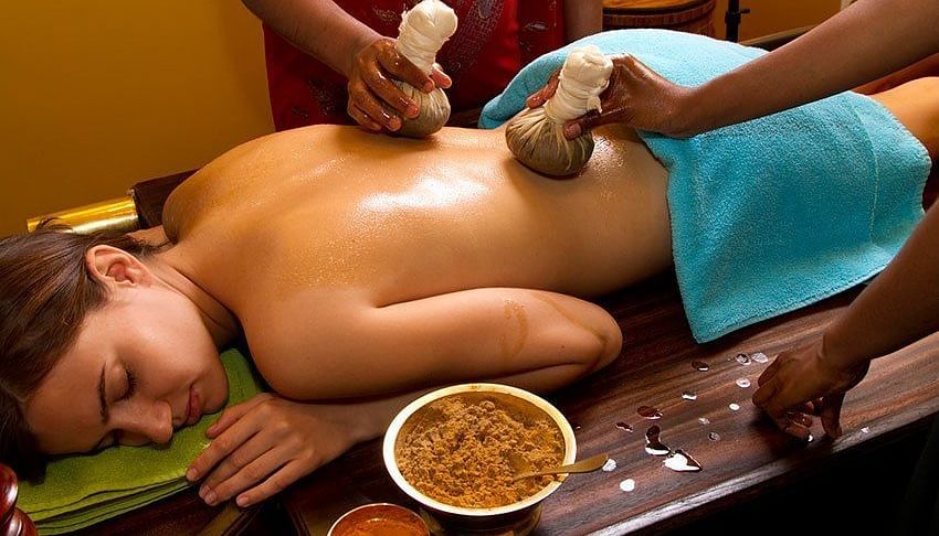 a Woman getting an ayurvedic massage at Ocean Spray Puducherry 