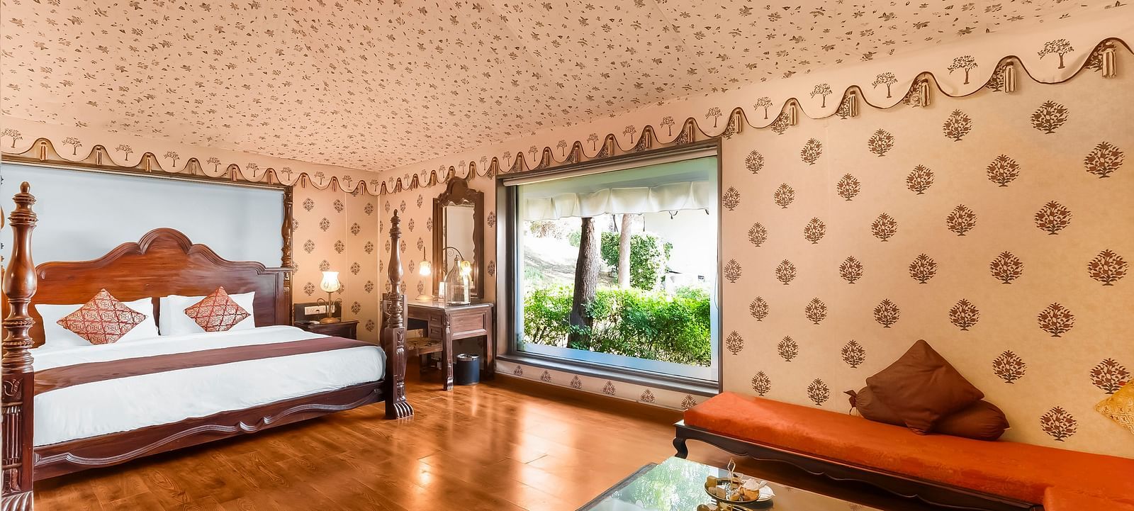 An overview of a room with a double bed, sofas and a coffee table seen - Rajasthali Resort & Spa, Jaipur.