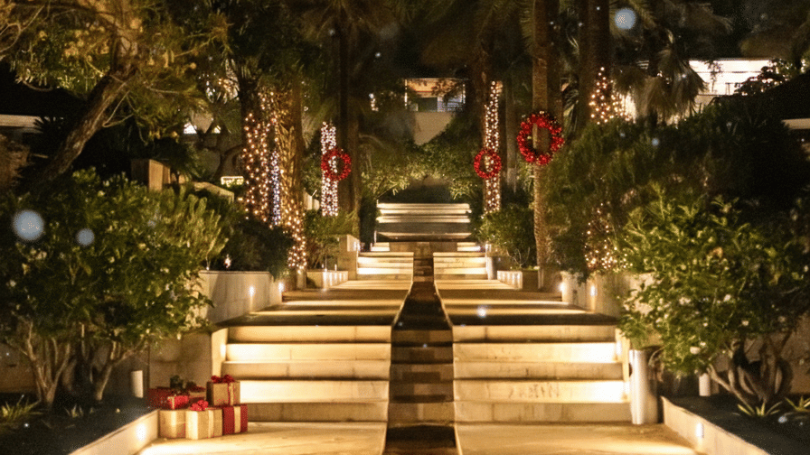 The Serai resort pathway illuminated with warm lights for the Christmas celebration.