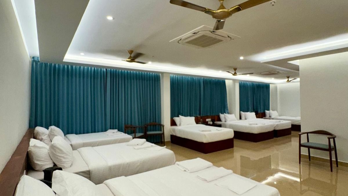 Image of Superior Family Deluxe Room with seven beds and fans on the ceiling  at Le Royale Palace.