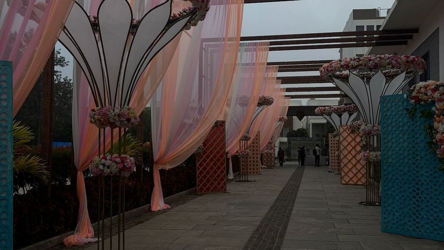 Pathway with Themed Wedding Decor and Sculpted Floral Arrangements - VRR Astoria Hotel and Conventional Centre