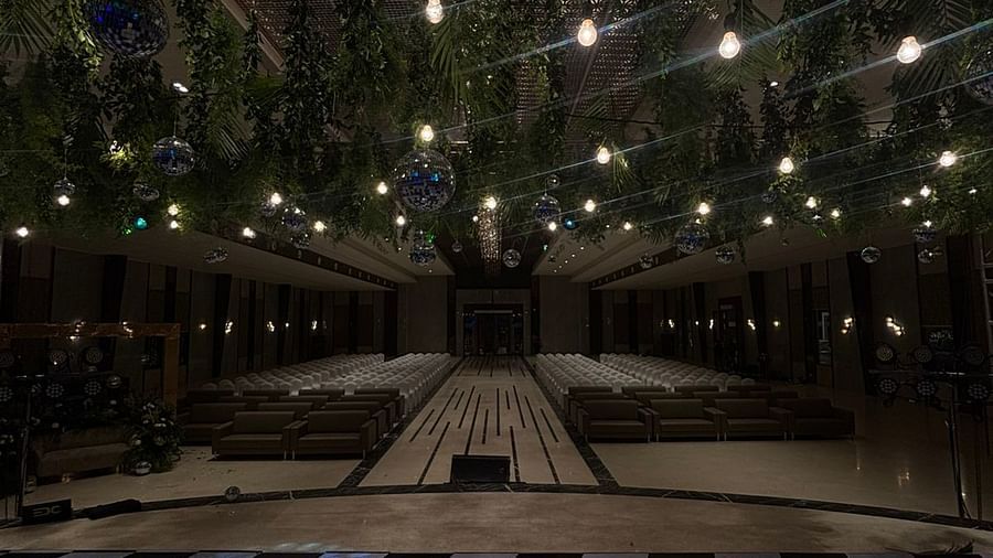 Outdoor Event Space with Checkered Flooring and Hanging String Lights - VRR Astoria Hotel and Conventional Centre