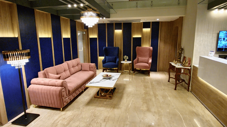 Stylish hotel lobby with comfortable seating, modern furnishings and warm lighting at Hotel Southgate Goa, Calangute, offering a welcoming space for guests.