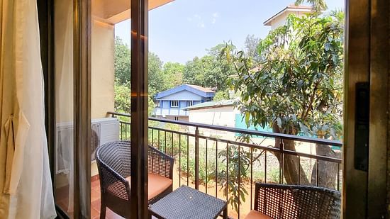 Picture showing the Balcony in the Super Deluxe Triple Suite, at ZARA’s Resort, Khandala