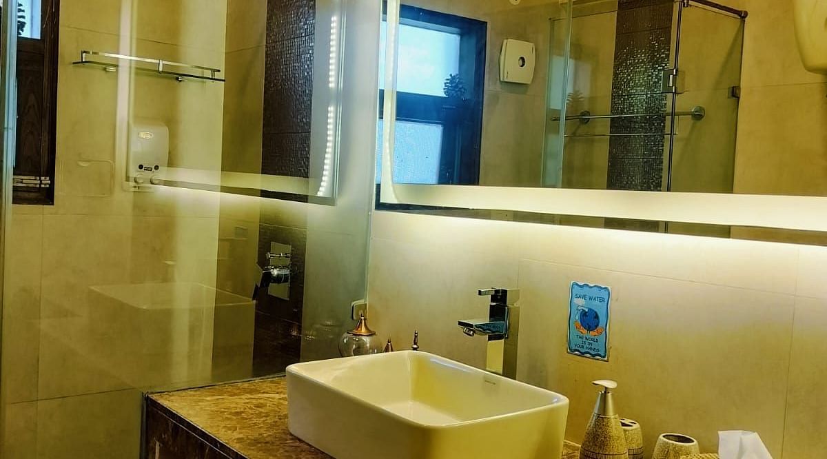 Vanity area of a washroom at 2 BHK at SOUTHGATE KASAULI BY ZENQ.