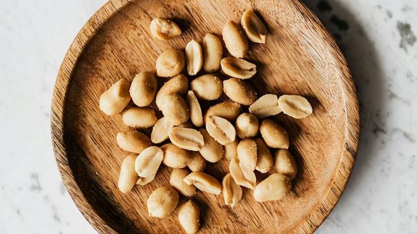 Image of a plate with salted peanuts placed on a table - The Dukes Retreat, Khandala
