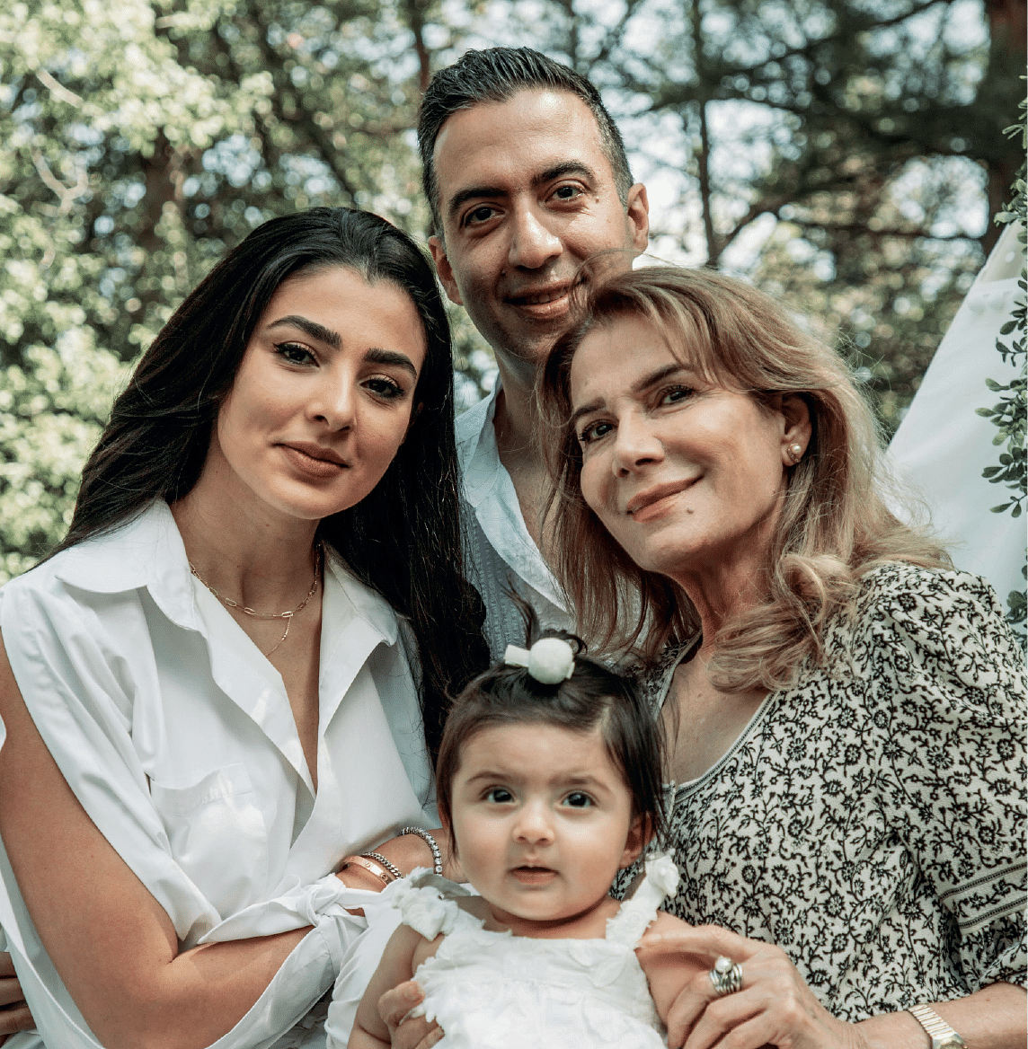 image of a family of four posing for a family portrait