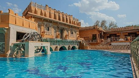 A pool side view of Ajit Bhawan