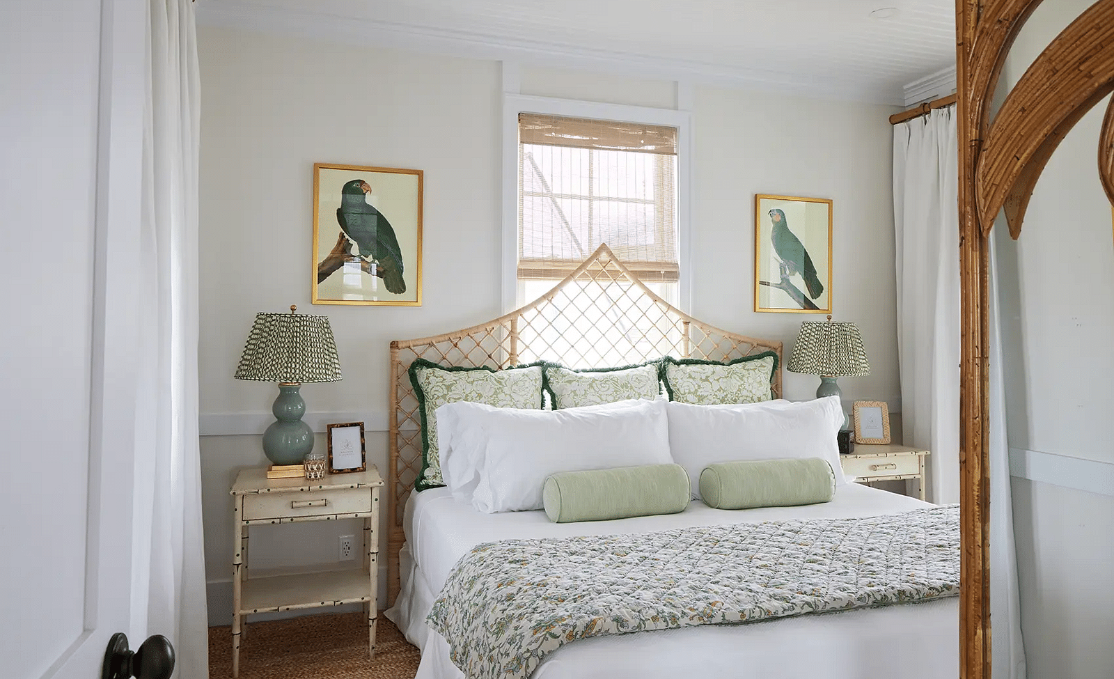 Bedroom with a green and white bedspread, rattan furniture, and natural light | Abaco Inn