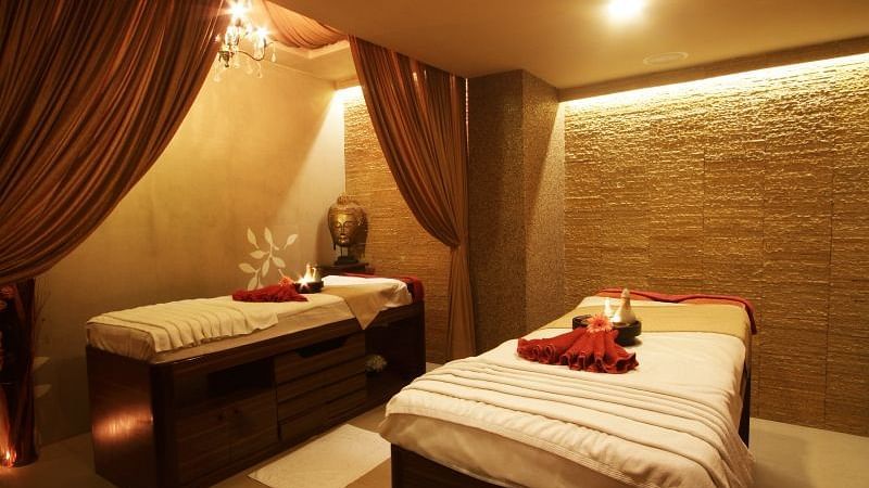 Image of a spa room with a spa bed at IOSIS spa & wellness Guwahati