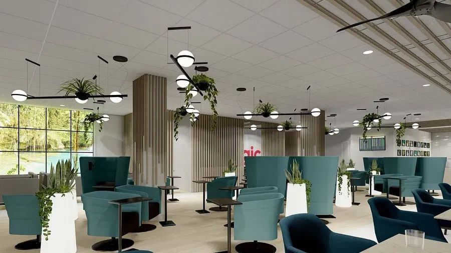 Spacious dining area with cosy seating and plenty of natural light streaming in.