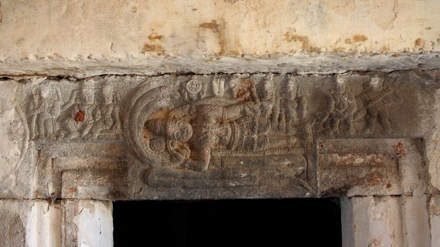 Stone carving of reclining Vishnu on Ananta Shesha.