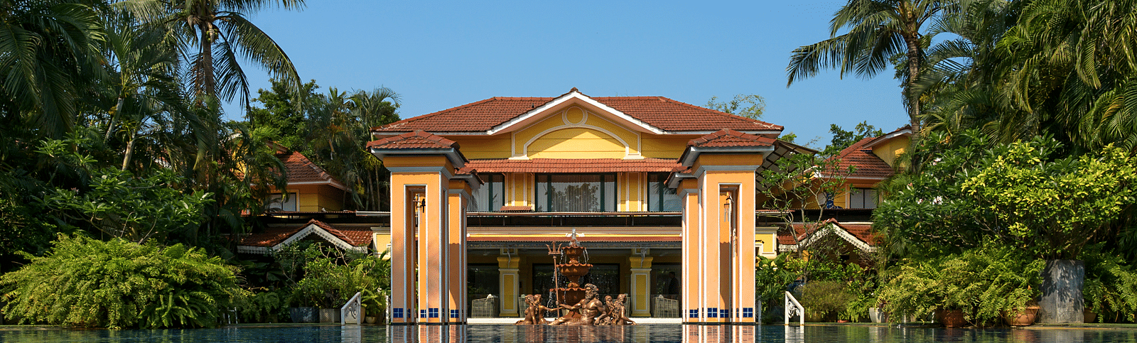 view of the resort and the pool in front of it - Mayfair Lagoon, Bhubaneswar