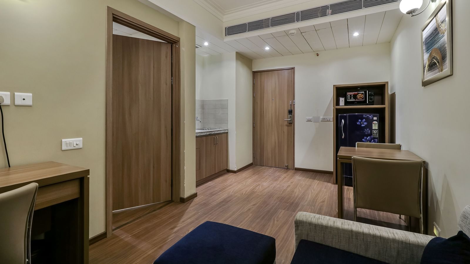 Living area in view inside Deluxe Suite - Starlit Suites Newtown, Kolkata