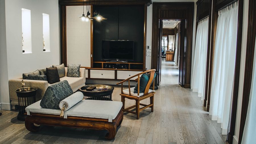 A common family seating area facing towards the television - two bedroom private pool beachfront villa