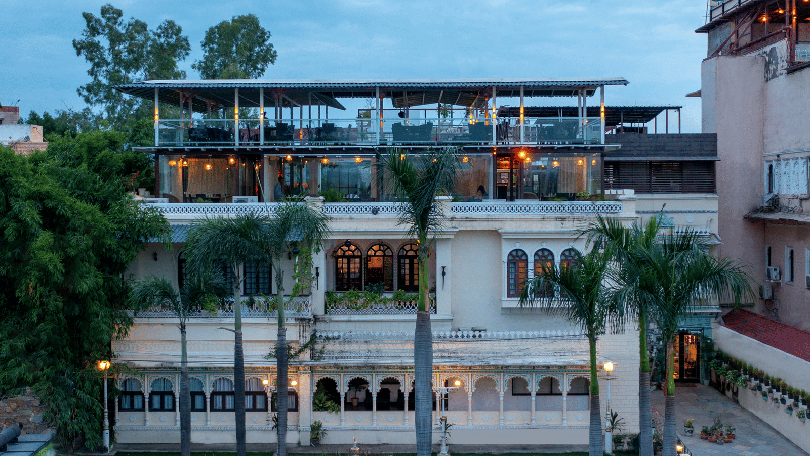 Facade view of the hotel during the evening with clear sky in background | Panna Vilas Udaipur