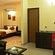 Hotel Arama Suites Bangalore living   bedroom area terra suite 2 hotel arama suites bangalore