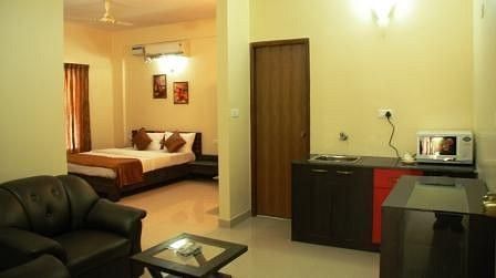 Hotel Arama Suites Bangalore living   bedroom area terra suite 2 hotel arama suites bangalore
