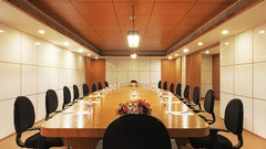 A rectangle table with chairs in Manthan Board Room - VITS Select, Rajkot.